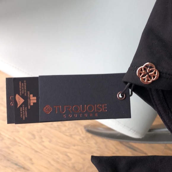 Black bikini top with white trim. - Picture 3 of 4